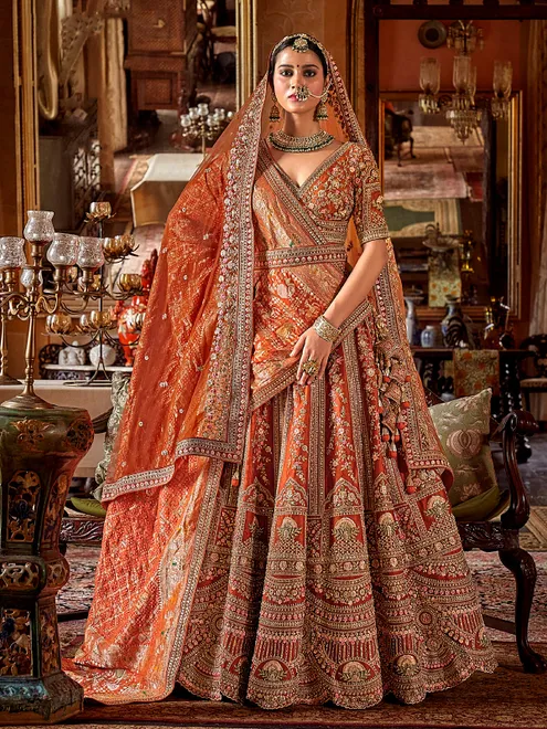 Orange silk bridal lehenga choli with sewuins work