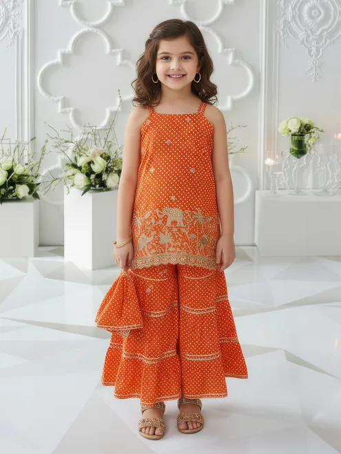 Orange silk printed sharara suit with dupatta