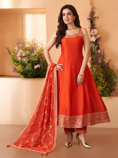 Orange silk salwar suit with bright festive allure for women