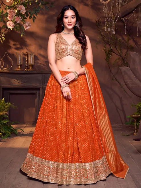 Orange silk V neck zardosi embellished lehenga choli