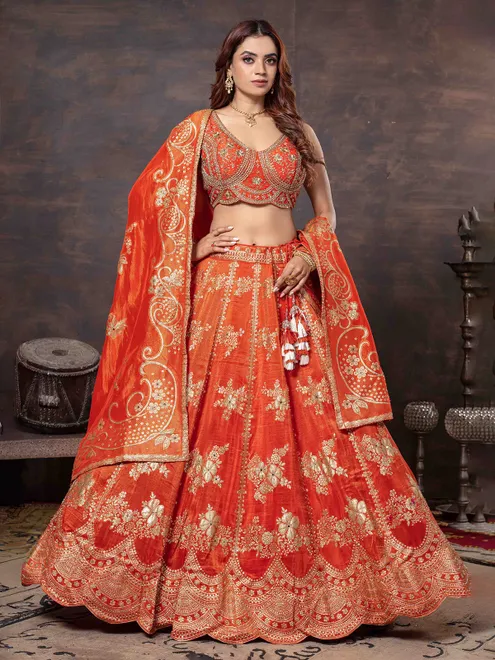 Orange sleeveless lehenga choli with dupatta