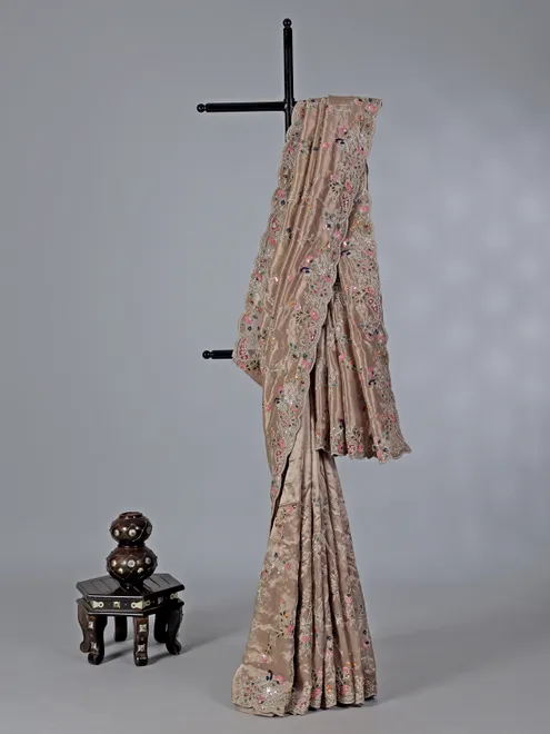 Pastel beige tissue silk wedding wear saree