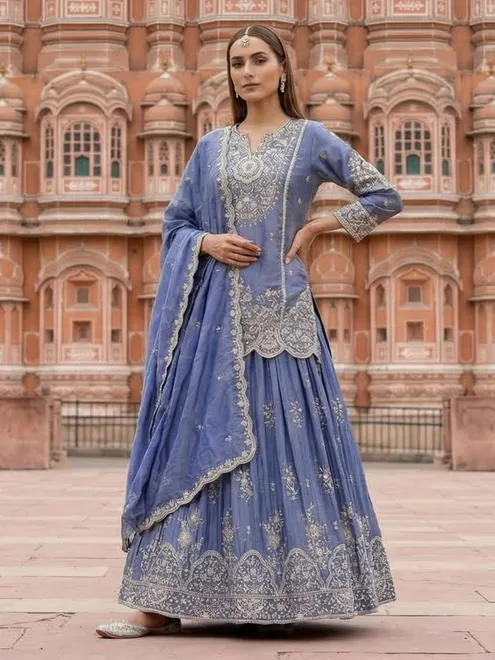 Pastel blue silk zardosi embellished festive lehenga suit