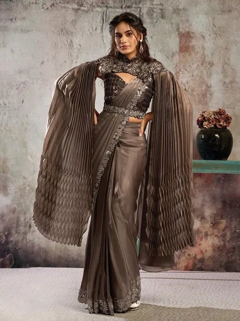Pastel brown armani satin saree with designer belt and cap