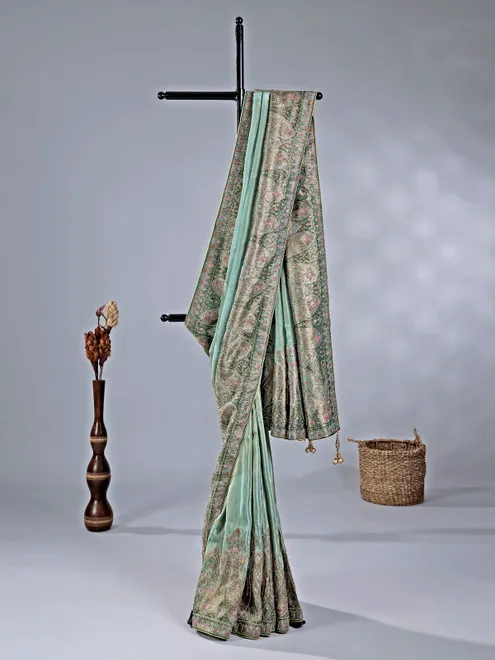 Pastel green silk saree with zari work for wedding wear
