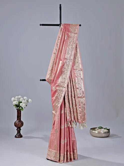 Pastel peach saree with cutdana and sequin detailing