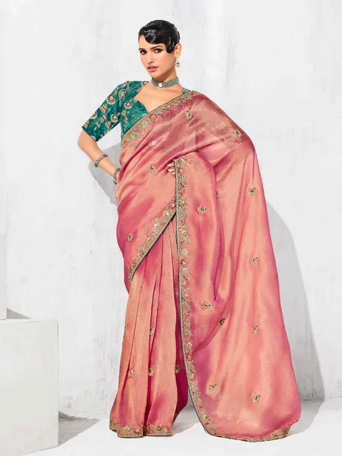 Pastel pink tissue silk saree with resham design