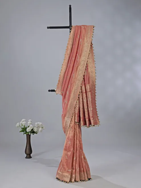 Peach dola tissue silk wedding wear saree with zari weaving