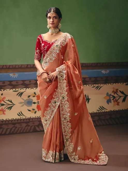 Peach fancy silk saree with rich embellishments