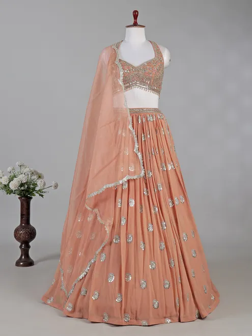 Peach georgette lehenga choli with mirror accents