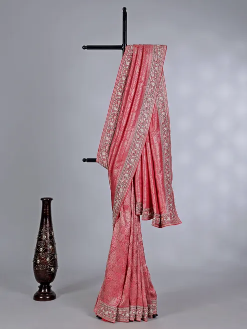 Peach kanjivaram silk saree decorated with sequins and cutdana work