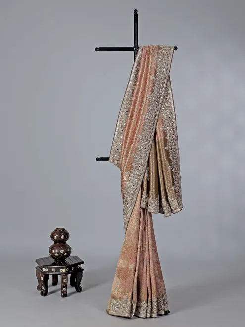 Peach kanjivaram with colorful motifs saree