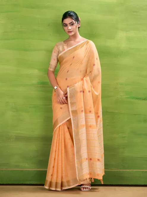 Peach linen silk saree with festive charm