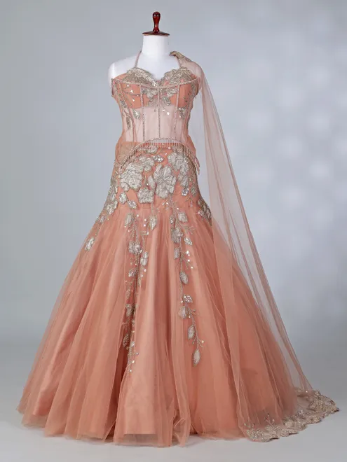 Peach net lehenga choli with attached dupatta