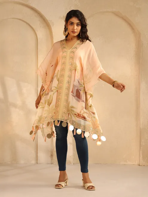 Peach printed crepe silk ponchos top with sequins work