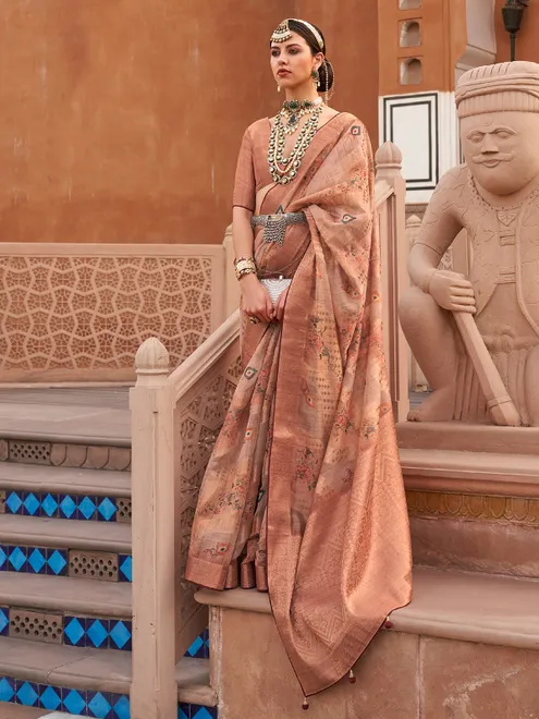 Peach printed organza saree with regal touch