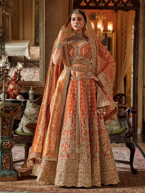 Peach silk bridal lehenga choli with two dupatta