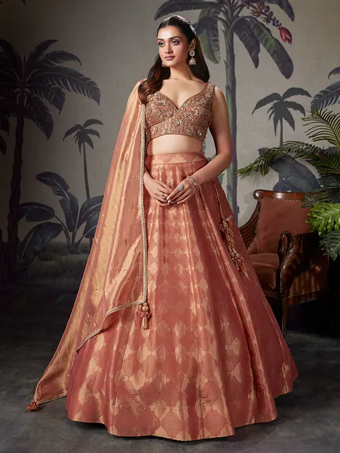 Peach silk lehenga choli for wedding celebration