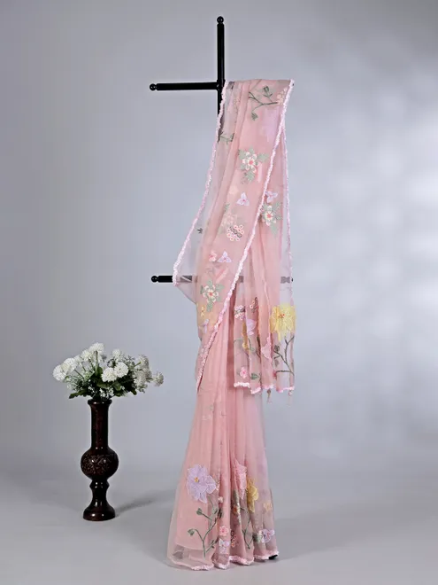 Pink embroidered organza saree for reception