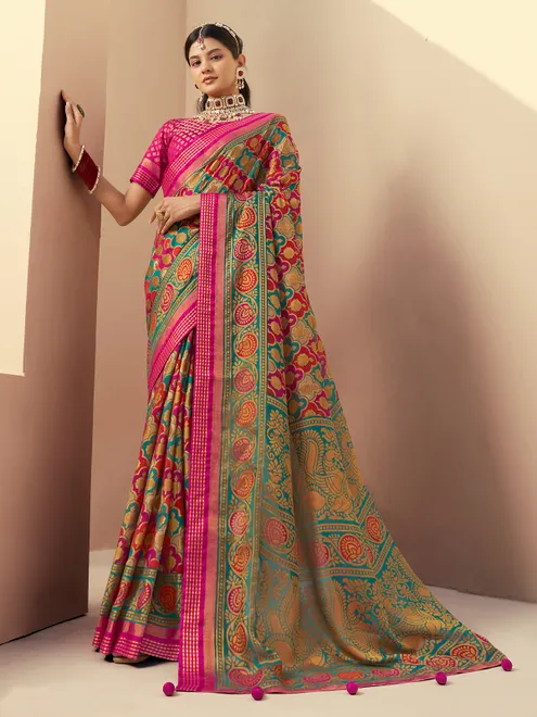 Pink georgette saree with gentle patterned design for festive wear