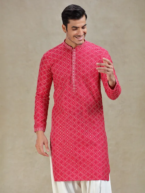Pink kurta salwar in symmetrical embroidery pattern