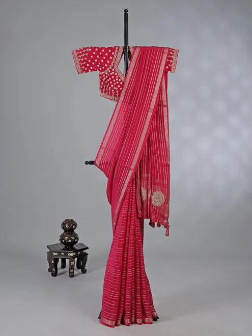 Pink organza saree with elegant zari weaving