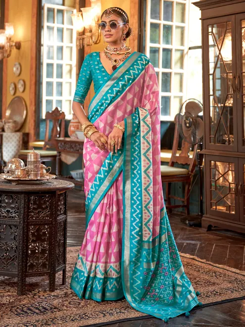 Pink printed silk saree with contrast aqua border