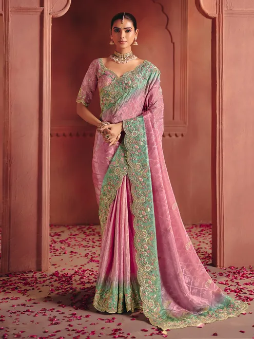 Pink silk blouse featuring ornate bridal embellishment