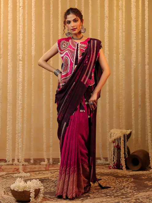 Pink trendy saree with embellished blouse