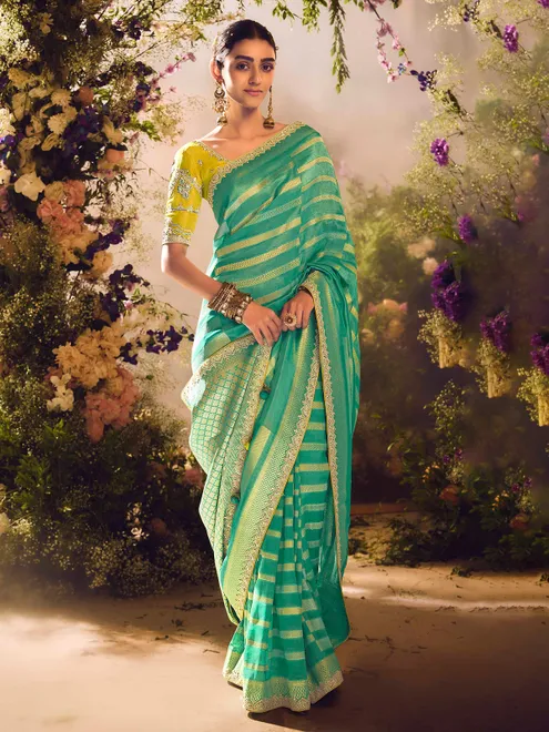 Pista green banarasi tissue saree with zardosi embellishments