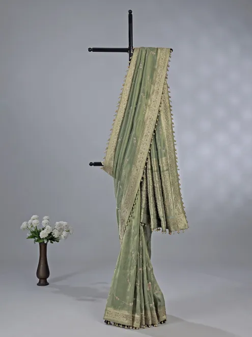Pista green dola tissue silk saree with zardosi work