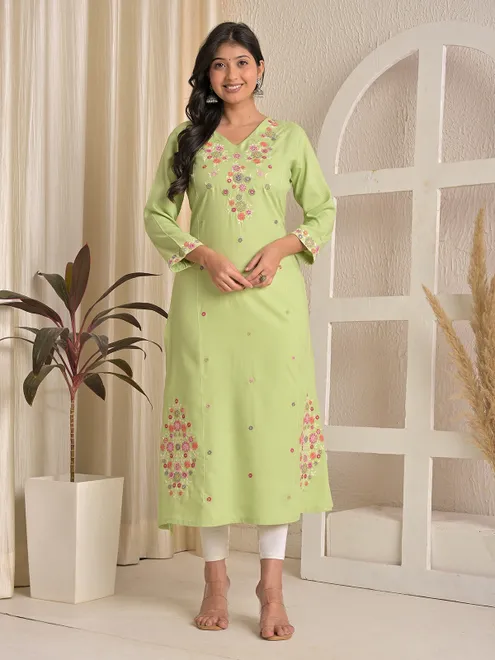 Pista green embroidered sequins work silk kurti