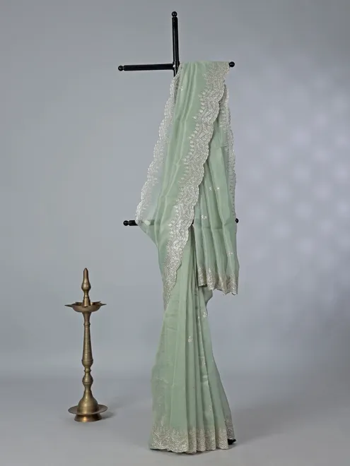 Pista green organza saree with thread work
