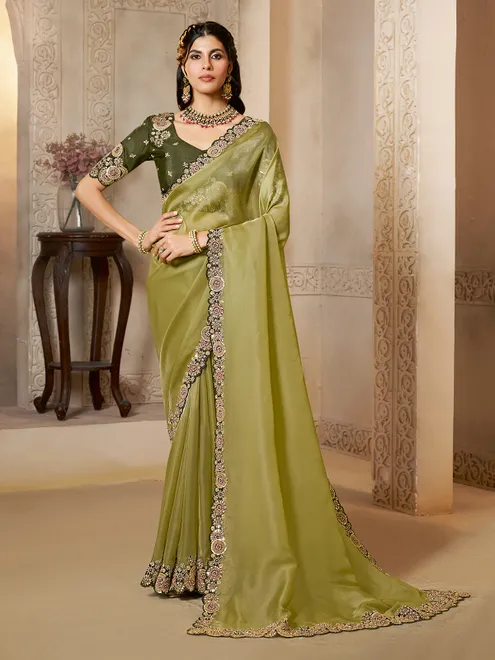 Pista green organza satin saree of serene glow