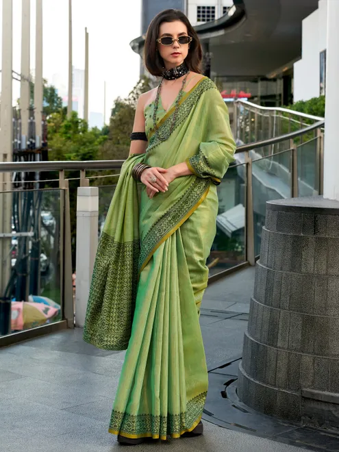 Pista green printed saree in linen tissue silk
