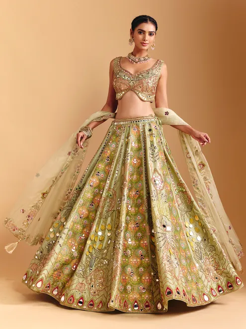 Pista green raw silk lehenga choli with printed artistry