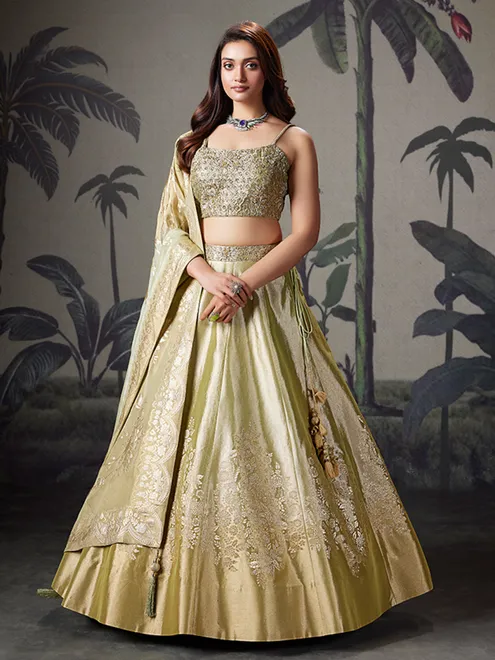 Pista green silk lehenga choli for wedding celebration