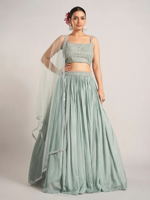 Pista green silk reception wear lehenga choli