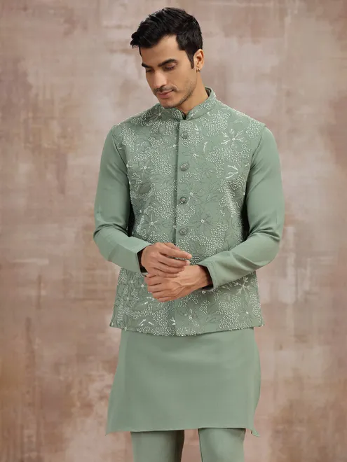 Pista green silk waistcoat set with cutdana work