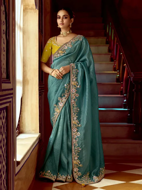 Rama blue tissue silk saree with resham details