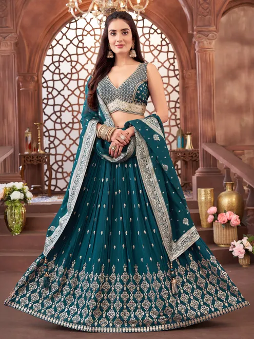 Rama green georgette V neck cutdana lehenga choli
