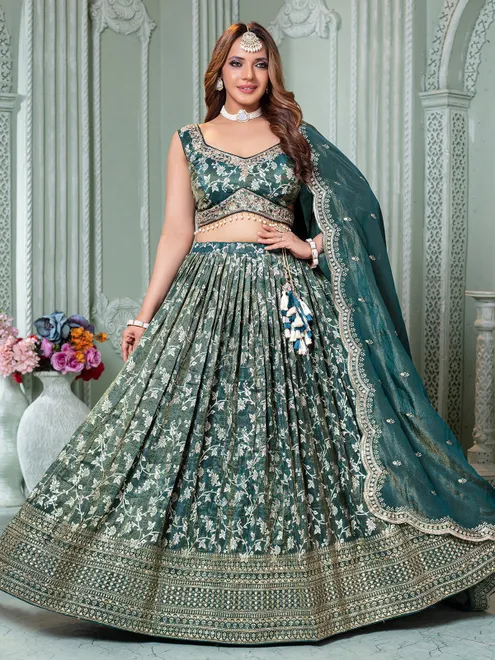 Rama green lehenga choli in premium tissue silk