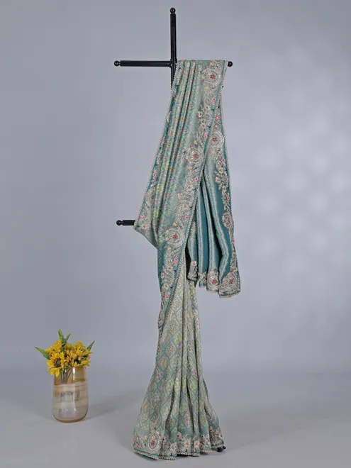 Rama green tissue silk festive wear saree with beads detailing