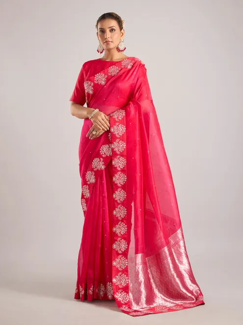 Rani color organza saree with ready made blouse