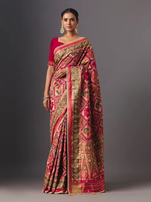 Rani pink art patola silk saree with elegant animal and bird motifs