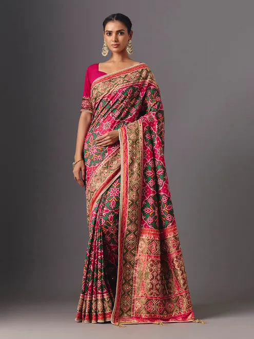 Rani pink art patola silk saree with graceful traditional elegance