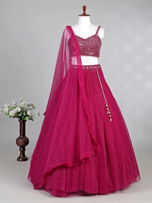 Rani pink net lehenga choli with diamond accents