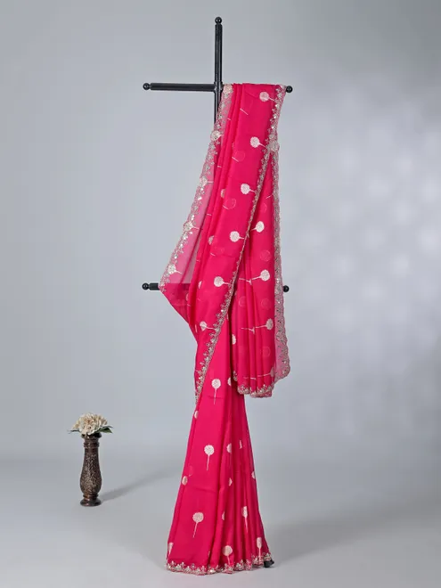 Rani pink organza saree with zari detailing