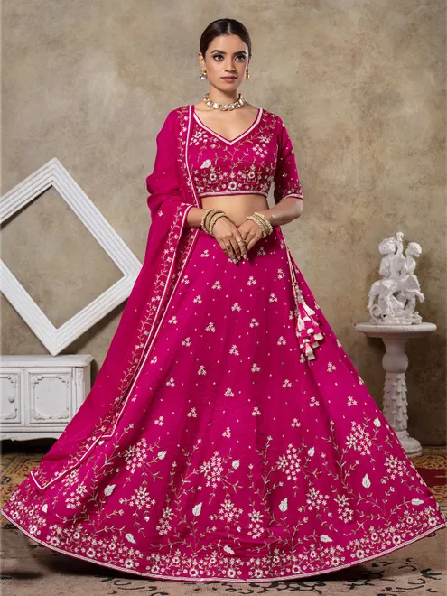 Rani pink raw silk lehenga choli for weddings