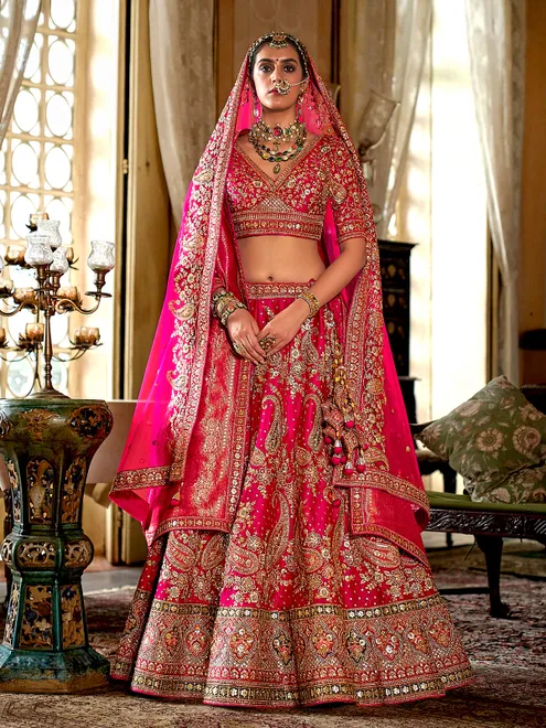 Rani pink silk bridal lehenga choli with rich beads and sequins work